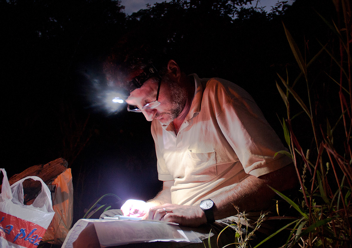 Checking maps and notes for the next day